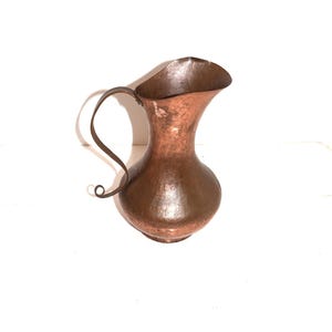 Rustic Hammered Copper Pitcher Hand Forged Arts and Crafts Styled Primitive Ewer Riveted Rat Tail Curved Handle Patina Farmhouse Decor
