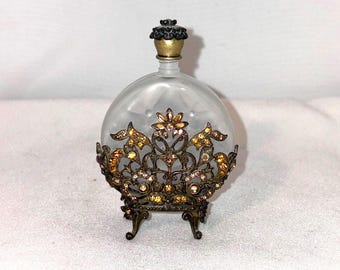 Ornate Amber Art Nouveau Style Rhinestone Jeweled Filigree Caged Satin Frosted Glass Perfume Bottle Encrusted Flower on 4 Feet Screw Stopper