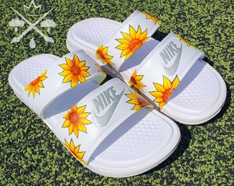 nike slides with sunflowers on them