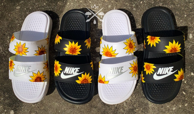 white nike sandals with sunflowers