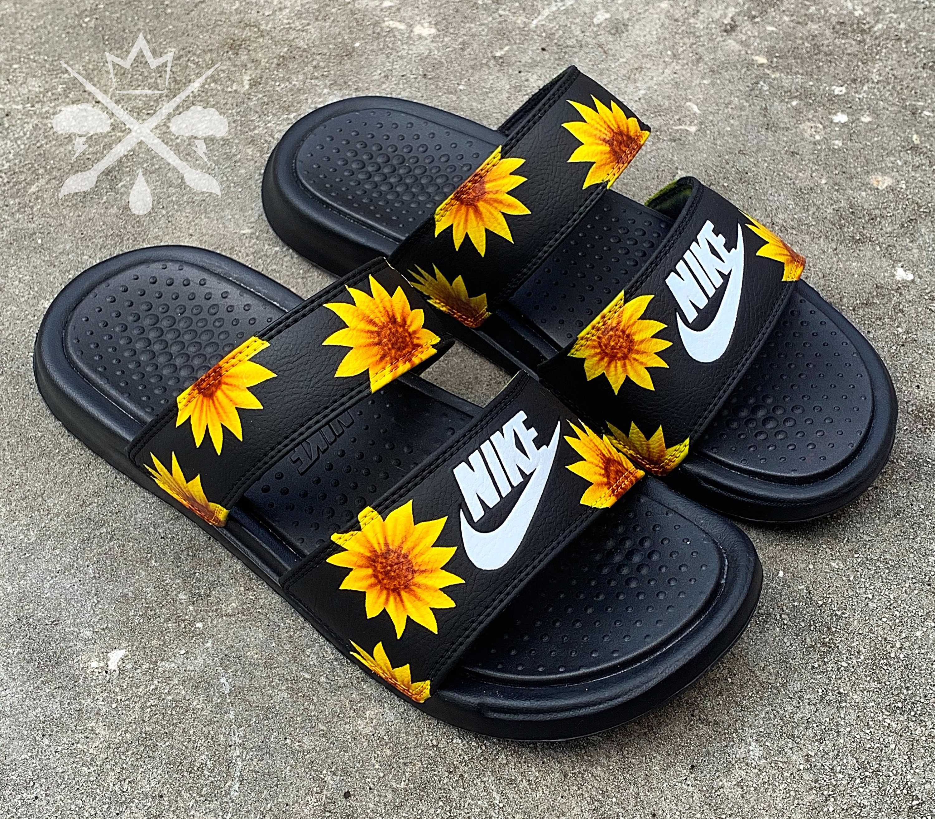 white sunflower nike slides