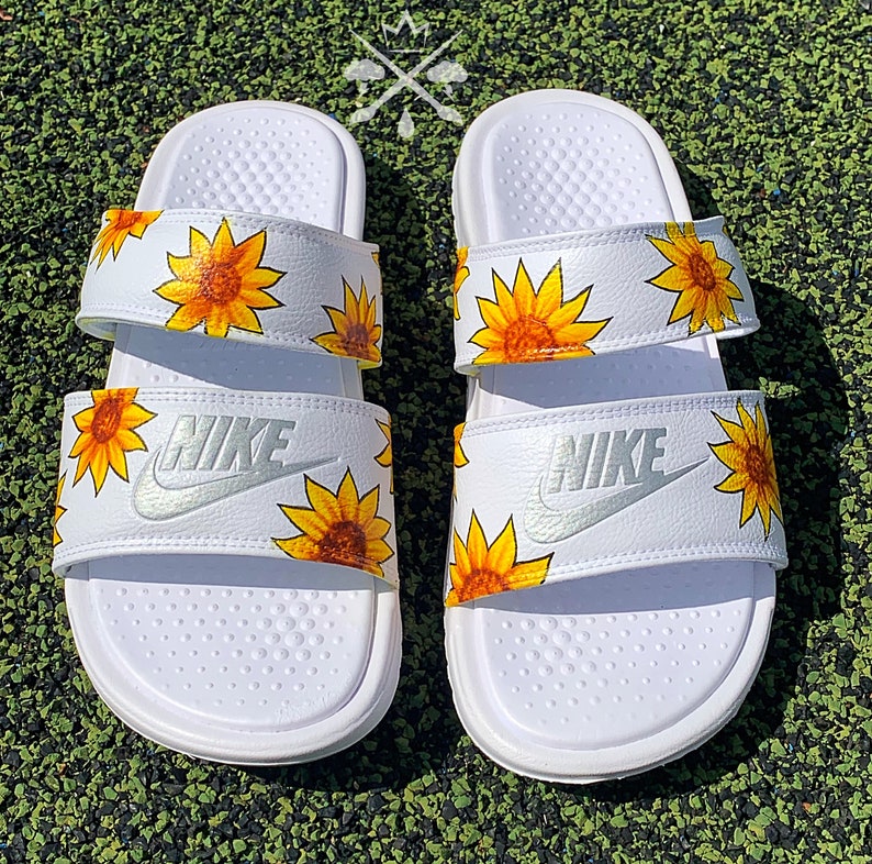 nike sunflower flip flops