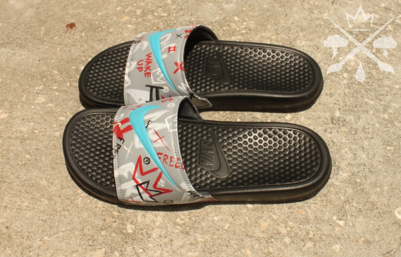 benassi swoosh slides