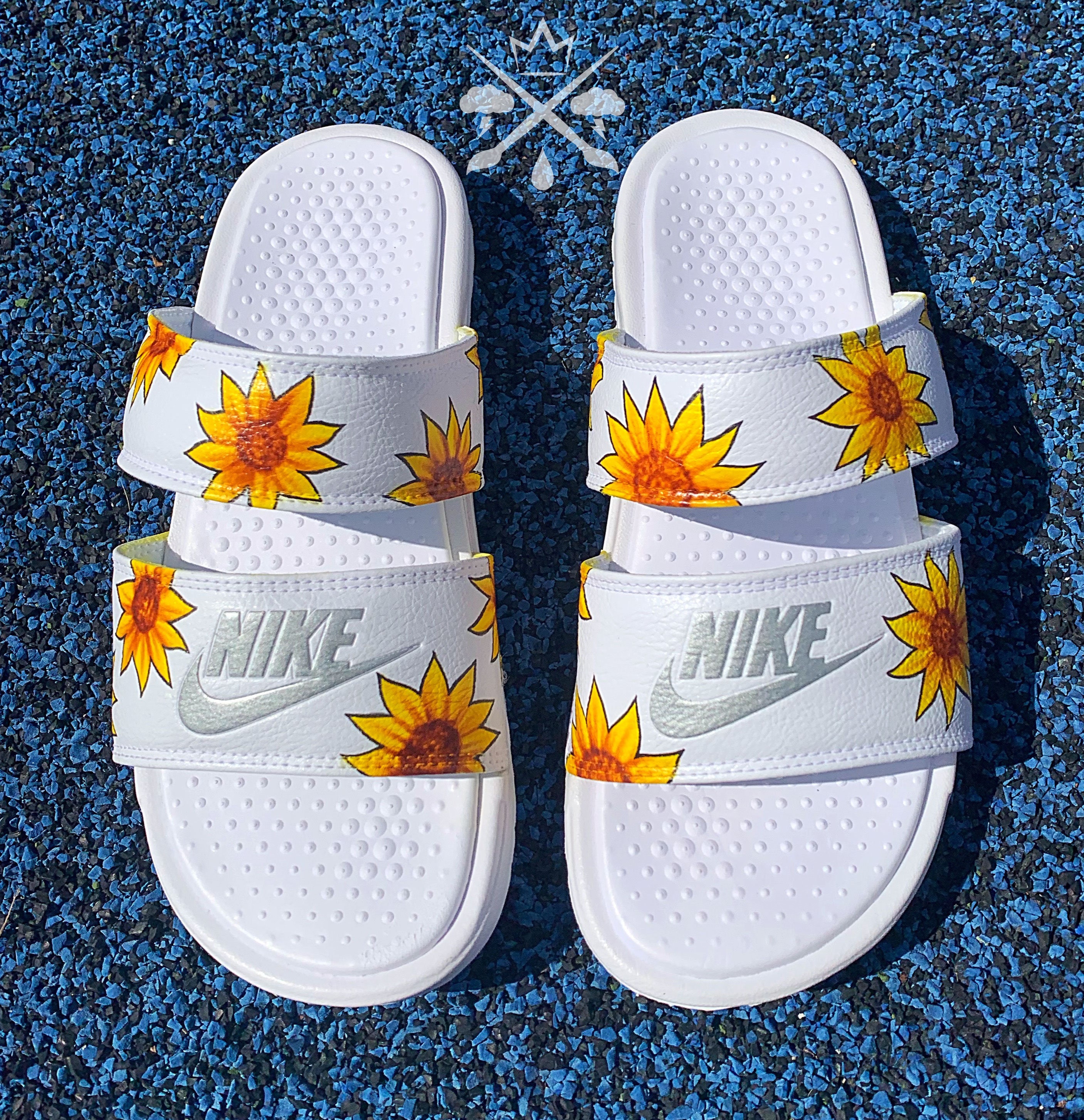 nike sunflower flip flops