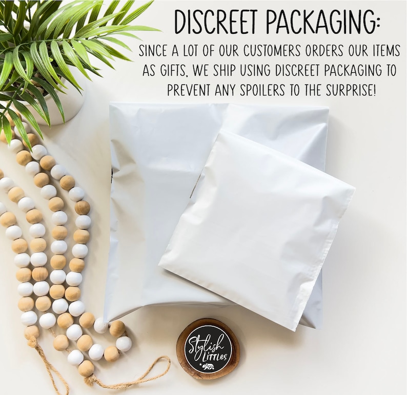 May include: Two white padded envelopes with the text "DISCREET PACKAGING: SINCE A LOT OF OUR CUSTOMERS ORDERS OUR ITEMS AS GIFTS, WE SHIP USING DISCREET PACKAGING TO PREVENT ANY SPOILERS TO THE SURPRISE!" on a white background. A small round wooden sign with the text "Stylish Littles" is in the bottom right corner.