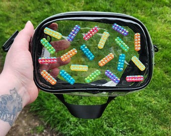 Riñonera transparente ajustable con lentejuelas arcoíris y diamantes de imitación, estilo EDM, ideal para festivales y raves.