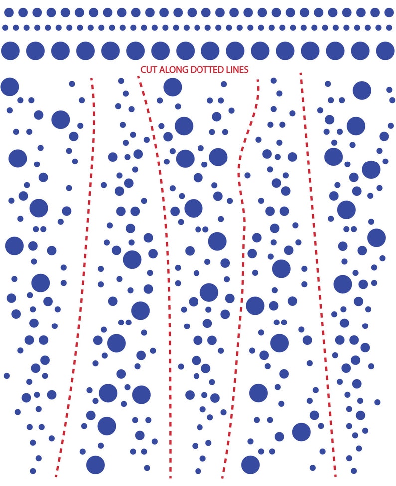 May include: A white sheet featuring a pattern of blue circles of varying sizes. The top section displays two horizontal rows of dots. Below, the text CUT ALONG DOTTED LINES appears above four vertical red dashed lines that divide the sheet into sections.