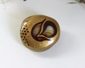 Hand-painted vintage glass brooch in brown and beige tones with an abstract pattern