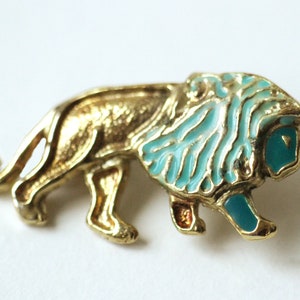 gold vintage lion brooch with a blue mane, zodiac sign jewelry