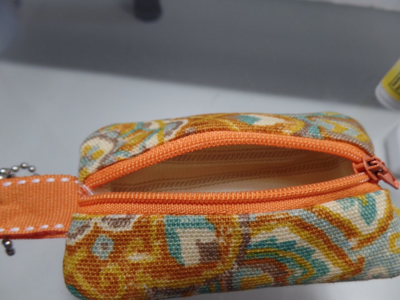 Chapstick zippered holderpouch lip balm or USB or coins or lanyard pouch key case