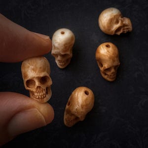 Antique Stained Skull Beads – Handcrafted Bone Carvings for Jewelry & Crafts, Top-Drilled, 17mm