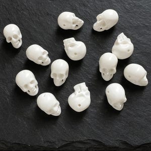 Hand-Carved Bone Skull Beads – 17mm Side-Drilled | Handcrafted Ivory-Tone Charms for Jewelry Making