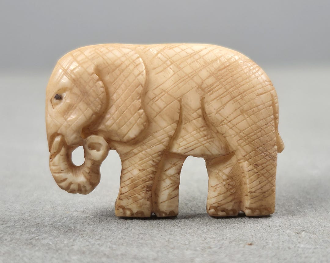 Handcrafted Elephant Carving • Natural Cow Bone With Antique Stain