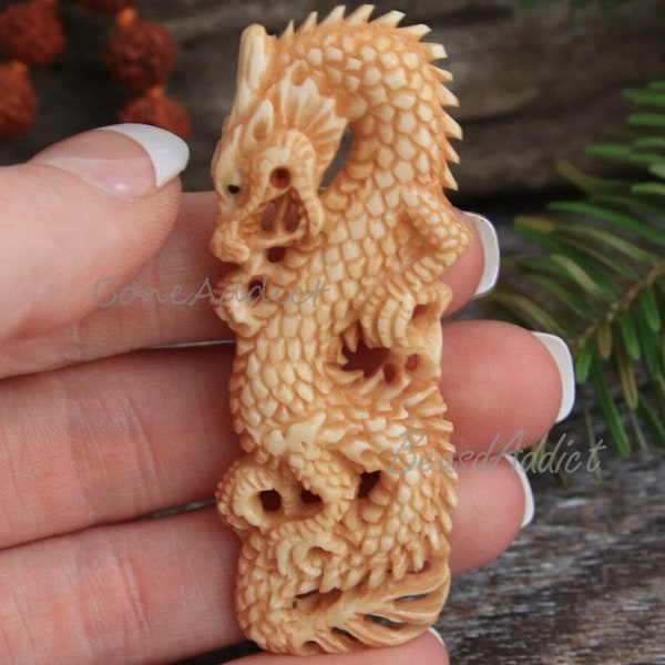 Handcrafted Stained Cow Bone Medieval Dragon Pendant Intricately Carved Zodiac Mythical Creature Faux Ivory BoneAddict Organic Jewelry 64MM