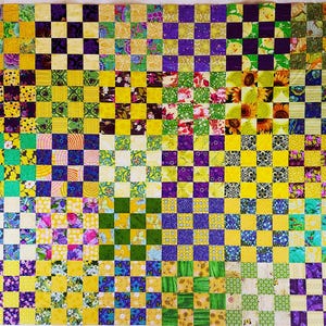 May include: A colorful patchwork quilt with a checkerboard pattern. The quilt features squares of various colors, including yellow, purple, green, and blue, with floral and patterned fabrics. The quilt is a vibrant and handmade textile.