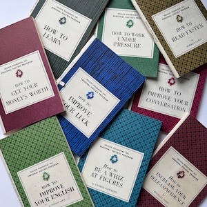 May include: A collection of vintage self-help books with titles like "How to Learn" and "How to Improve Your English." The books have patterned covers in various colors, including green, blue, and burgundy, with white labels and black text. The books are from the "Nelson Doubleday Inc. Personal Success Program."