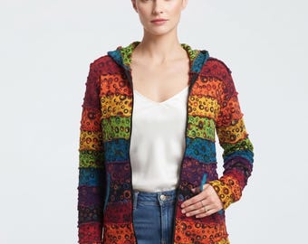 May include: A zip-up hooded jacket featuring horizontal stripes in a rainbow color palette. The fabric has a textured, circular pattern throughout, with long sleeves and a black zipper closure running down the center front.