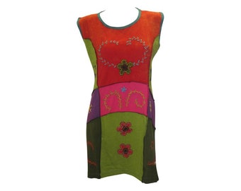 May include: A sleeveless patchwork dress with a heart-shaped design in the center. The dress is made of different colored fabrics, including red, pink, green, and purple. The heart is embroidered with flowers and leaves.