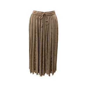 May include: A beige skirt with a drawstring waist and a floral pattern. The skirt has a slightly uneven hemline.