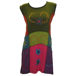 May include: A colourful patchwork dress with embroidered floral designs. The dress has a green, purple, pink and blue colour scheme.