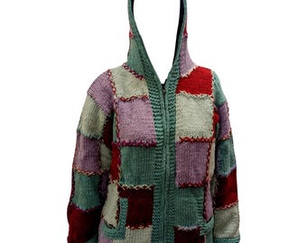May include: A patchwork knit hooded jacket in shades of red, purple, green, and gray. The jacket features a full zipper, two front pockets, and a hood. The design is made of squares of different colors, stitched together with contrasting thread.