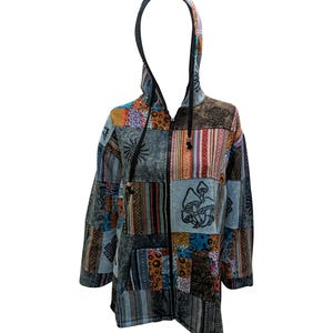 May include: A blue, brown, orange and green patchwork hooded jacket with a zip closure. The jacket features a variety of patterns and designs, including stripes, paisley and geometric shapes.