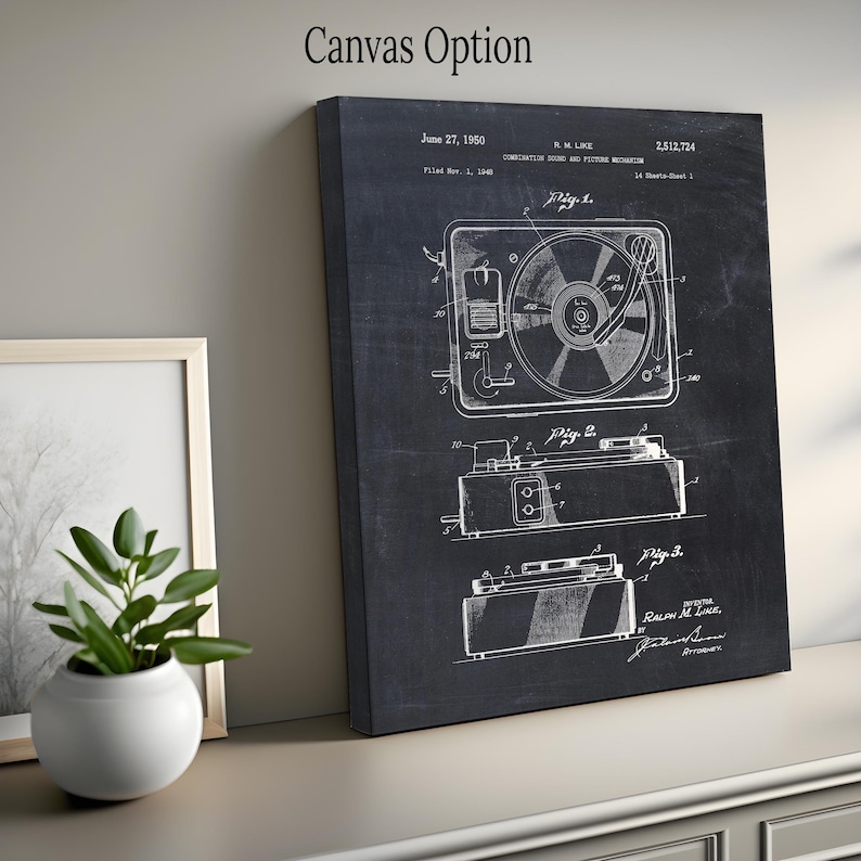 May include: A black and white vintage patent drawing of a record player. The patent number is 2,512,724 and the date is June 27, 1950. The drawing shows the record player in three different views.