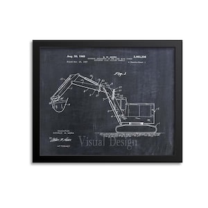 May include: Framed black and white blueprint of a backhoe excavator, dated August 26, 1969. The drawing includes the inventor's name, George W. Mork, and the patent number 3,463,336. The text "Visual Design" is also present.