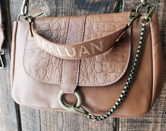 “LOU” handbag in camel cowhide leather. Velvet leather interior.