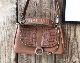 "LOU" handbag in smooth hazelnut leather and croco calfskin. Flap with rivets