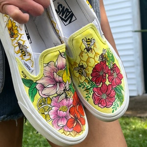 Flowers and bee design with honeycombs and lemons vans slip on hand painted custom shoes