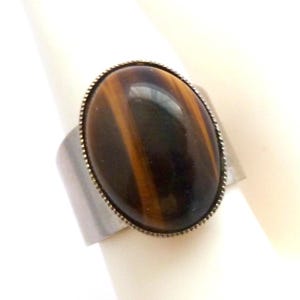 Vintage Modernist Style Stainless Steel And Tigers Eye Gemstone Set Ring With An Adjustable Size Band, 70s Jewellery