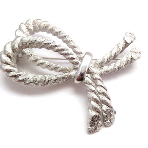 Vintage große strukturierte Band abstrakte Schleife Design Brosche von Christian Dior, Schmuck der 80er Jahre