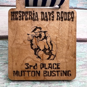 Custom Design . Wood Medal . Rodeo  . Laser Engraved .  Mutton Busting . Hand Finished . Awards .