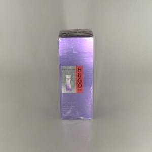 May include: A set of three ceramic mugs with a speckled, matte finish in cream, light grey, and dark grey. Each mug has a simple, minimalist design and a rounded handle.