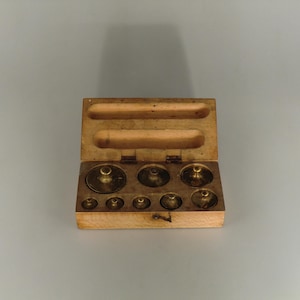 Antique brass weights scale set in original retail wooden box