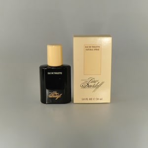 May include: A set of three ceramic mugs with a speckled, matte finish. The mugs are in shades of cream, light grey, and dark grey. Each mug has a simple, minimalist design, ideal for coffee or tea.