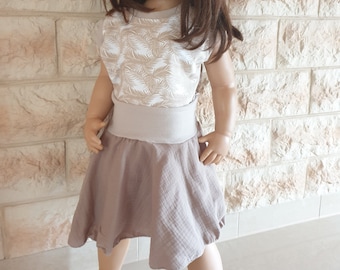 Fantastic muslin dress for girls with feathers