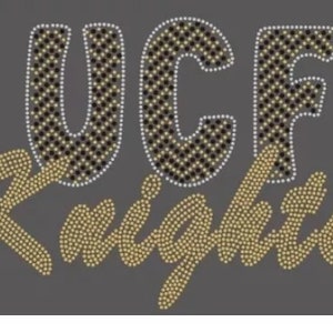 May include: UCF Knights logo in gold and black rhinestones on a gray background.