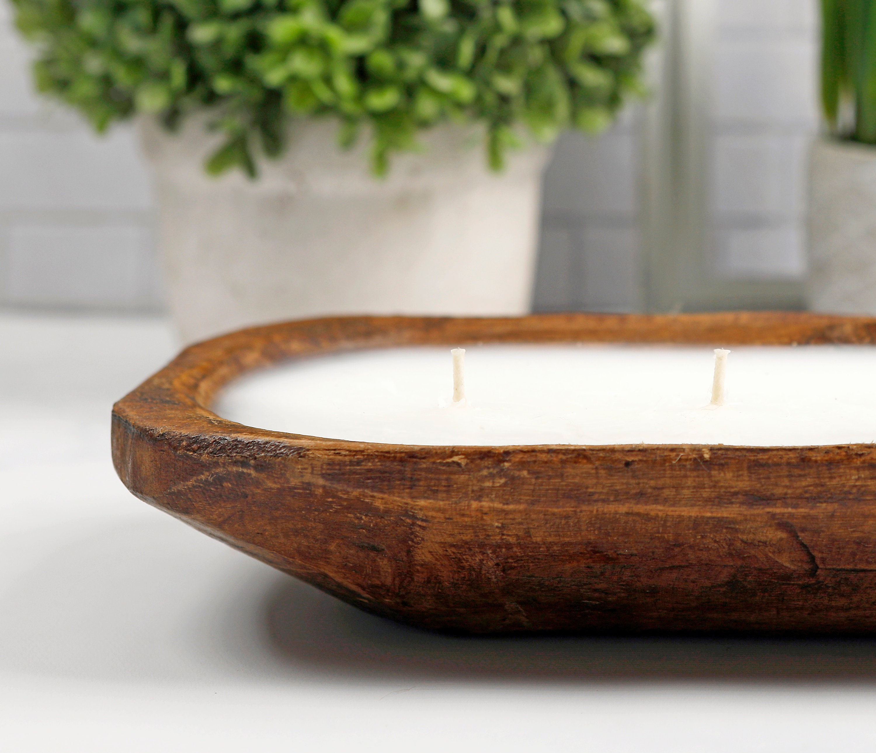 - Nature's Embrace: Candle In A Wooden Bowl For A Calming And Natural Touch