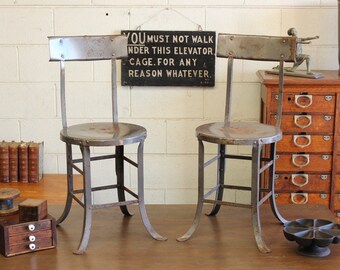 Pair Vintage Industrial Angle Steel Stool Co. Factory Chairs w/ Backrests - 1930s