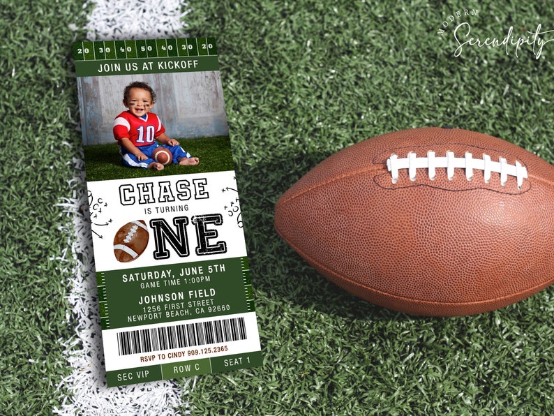 May include: A green and white ticket-style invitation for a first birthday party. The invitation features a photo of a baby boy wearing a red and white football jersey. The text on the invitation reads "Chase is turning one" and includes details about the party, including the date, time, and location. The invitation also includes a football graphic.