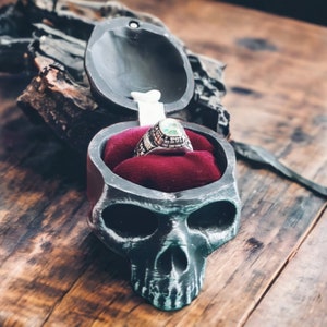 Skull engagement, proposal or ring box.  Clay sculpted and hand painted with a sparkly or velvet interior by myself. No ring included,