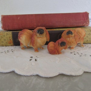 A Sweet Miniature Family of Three Pekingese Dogs Ceramic Porcelain Collectibles Mom Dad Baby