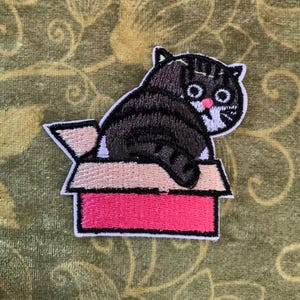 Embroidered iron on patches. Range of designs available. Batteries, cats, bunnies and more!