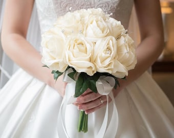 A Wedding Bouquet Collection of Ivory Artificial Fuax Silk Roses