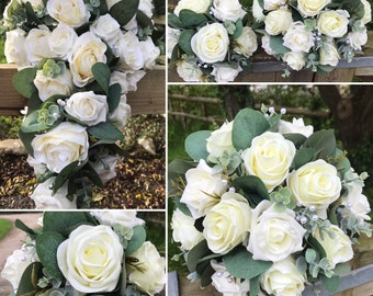 A teardrop wedding bouquet collection of artificial ivory roses