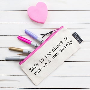 Life is too short to remove a USB safely......The perfect gift! Quality zipper pencil case!