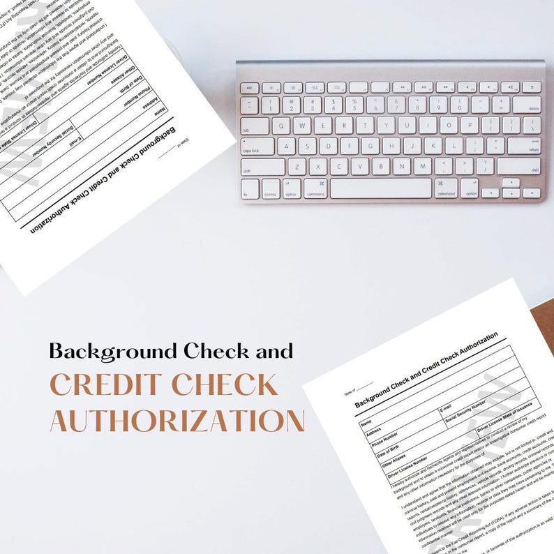 May include: A black and white document with the text "Background Check and Credit Check Authorization". The document is on a white surface with a silver keyboard.