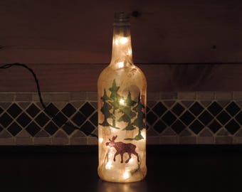glass bottle lighting cut glass moose and pine trees wine bottle light rustic nightlight lodge decor camp living handcrafted wine etsy glass bottle lighting cut glass moose and pine trees wine bottle light rustic nightlight lodge decor camp living handcrafted wine etsy